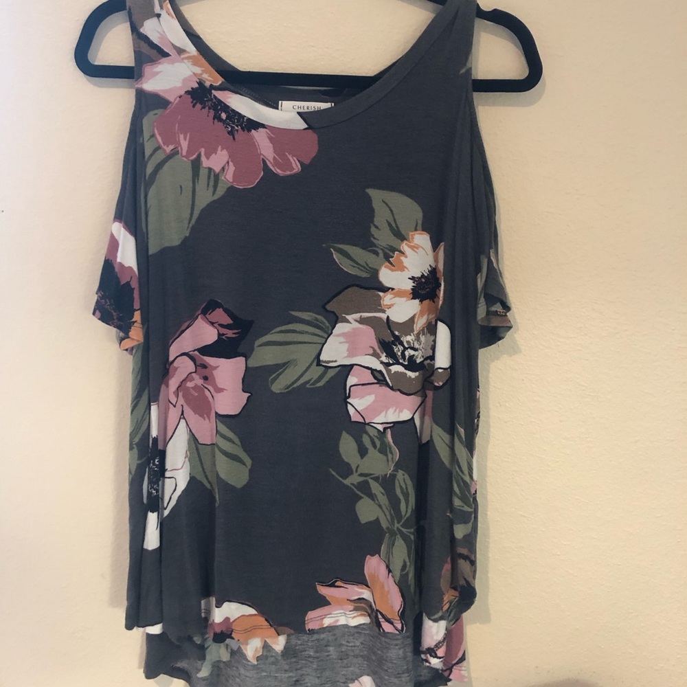 Size small-medium tee by the brand Cherish. Only worn a few times.
